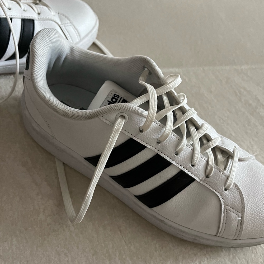 Adidas tennis shoes.